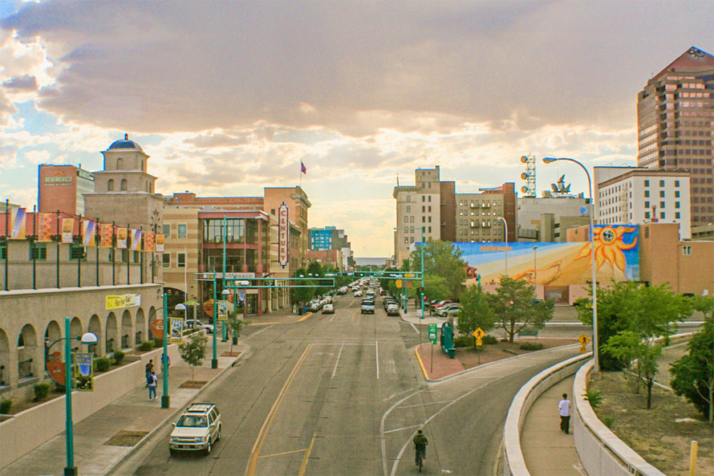 A photo of downtown Albuquerque during sunset.